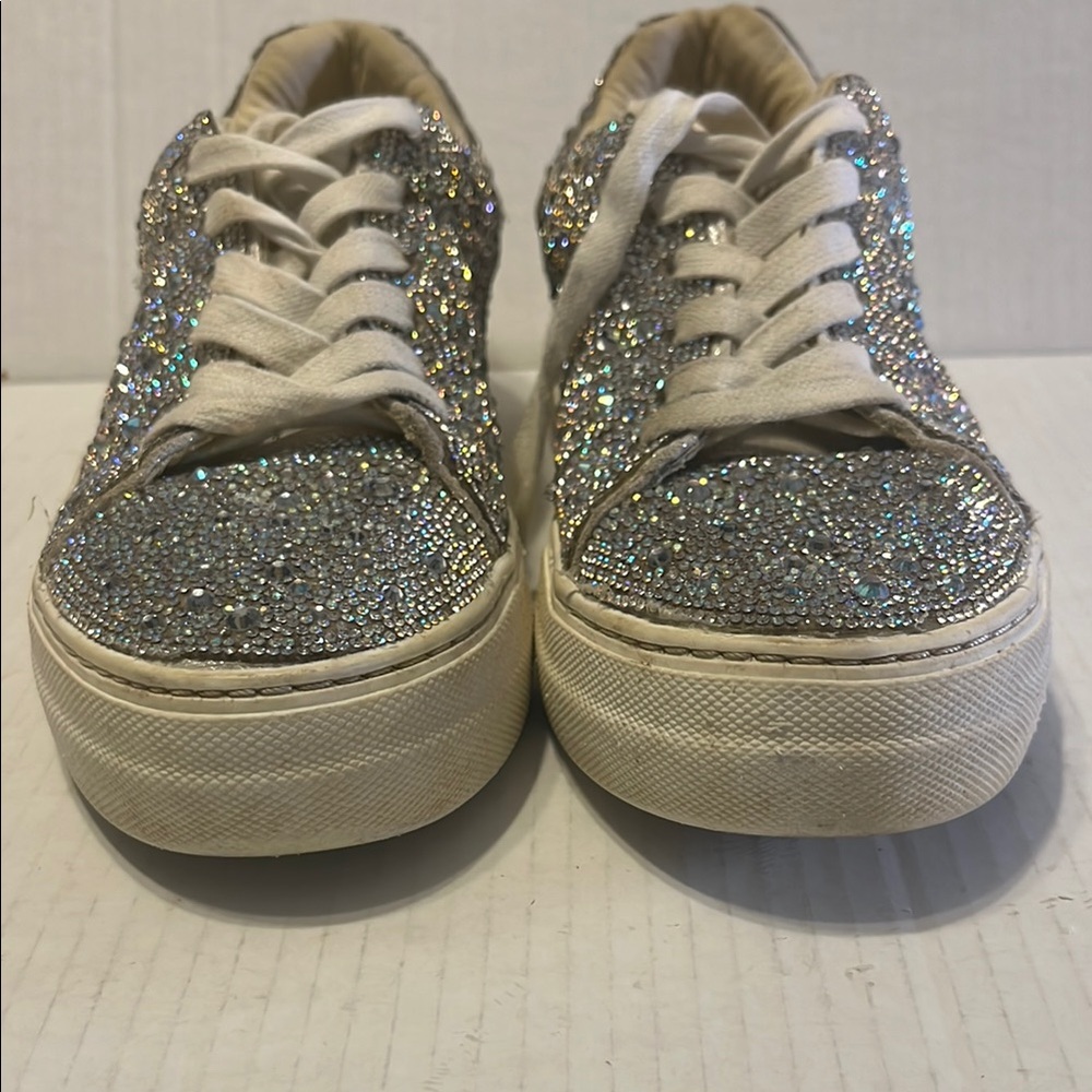 Betsey Johnson’s Sparkling Silver Glitter Sneakers